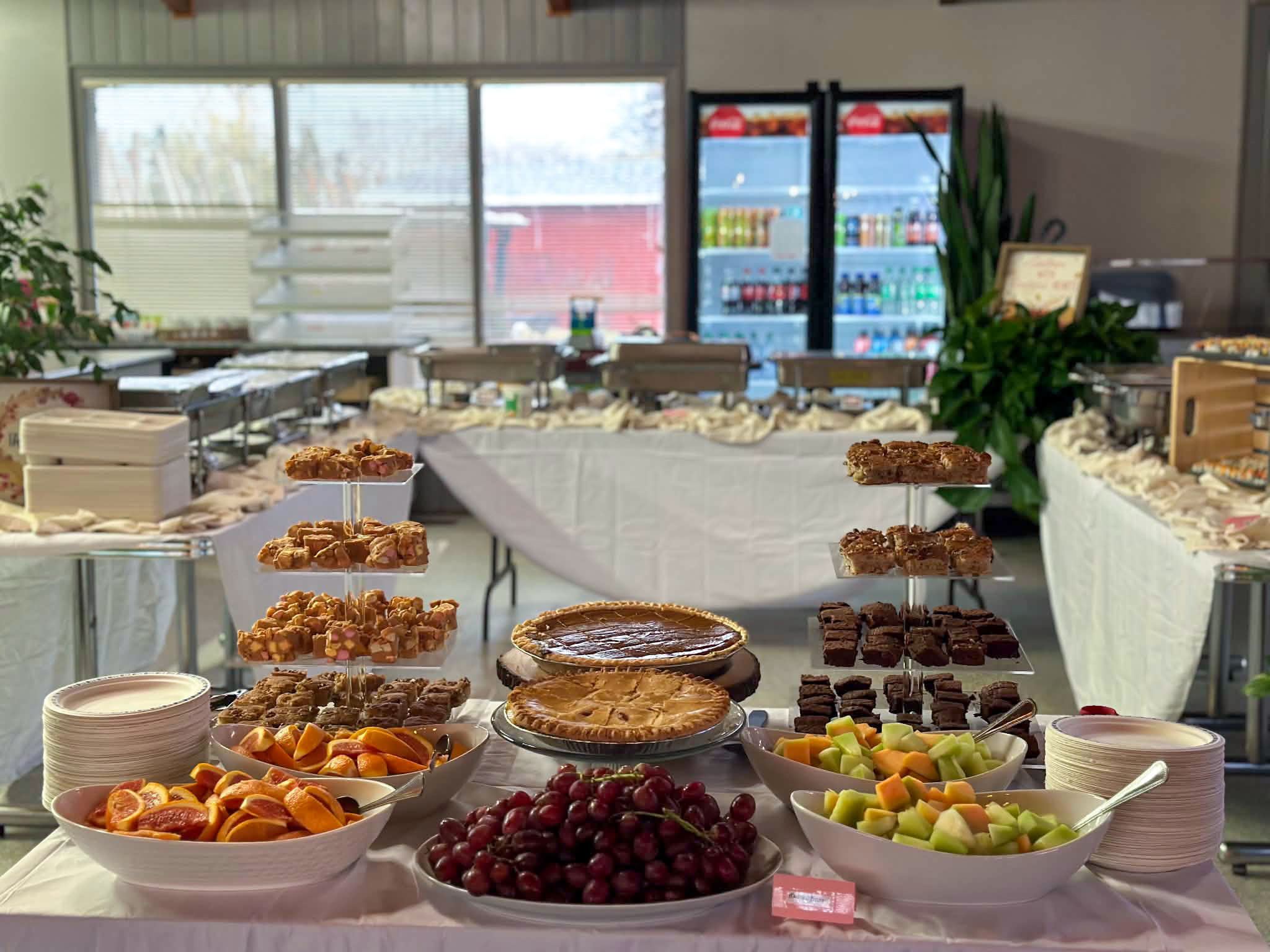 Generous Sunday brunch buffet spread — eggs, pastries, fresh fruit at RR & 3A's Cafe